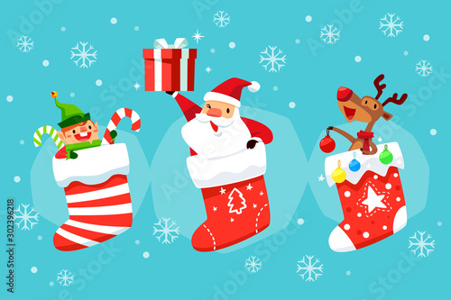 Santa claus elf and reindeer in christmas socks