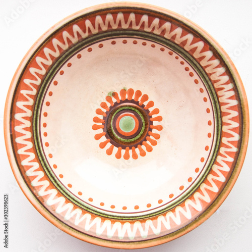 A plate painted with ethnic Slavic patterns