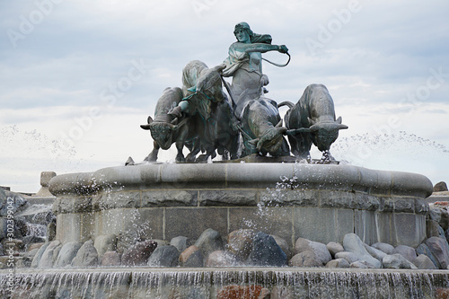 Gefion Fountain (Gefionspringvandet), a large fountain on the harbour front in Copenhagen, Denmark photo