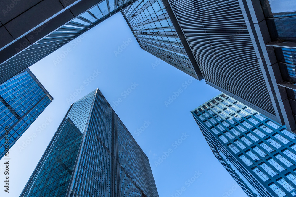 Fototapeta premium low angle view of skyscrapers in city of China.