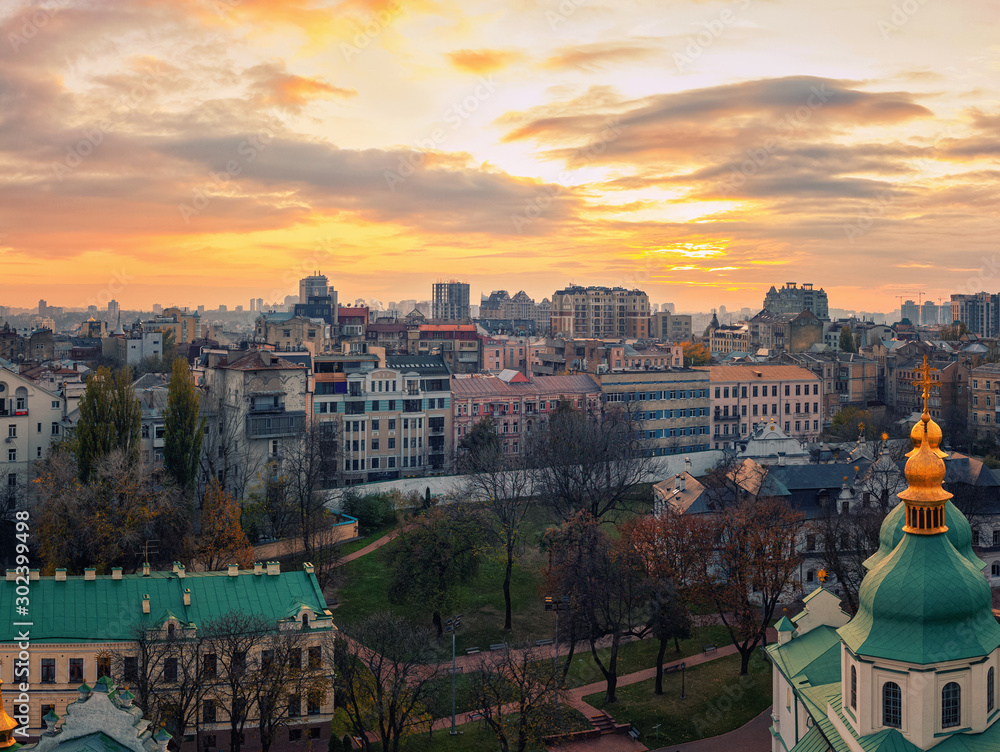 Naklejka premium Aerial view of Kyiv city, St. Sophia Cathedral at sunset, Ukraine. Panoramic cityscape