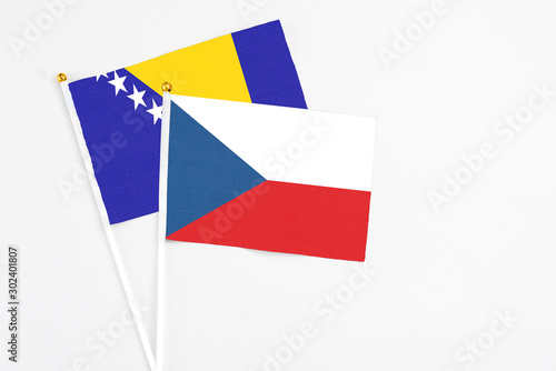 Free Download Czech Republic and Bosnia Herzegovina stick flags on white background. High quality fabric, miniature national flag. Peaceful global concept.White floor for copy space. - GFXLoad