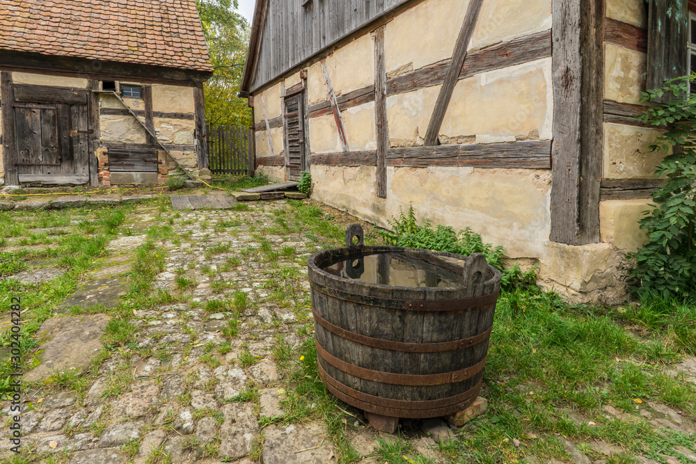 Bad Windsheim, Germany - 16 October 2019: View from a half timbered house in a german village. Bad Windsheim, Germany - 16 October 2019: View from a half timbered house in a german village.