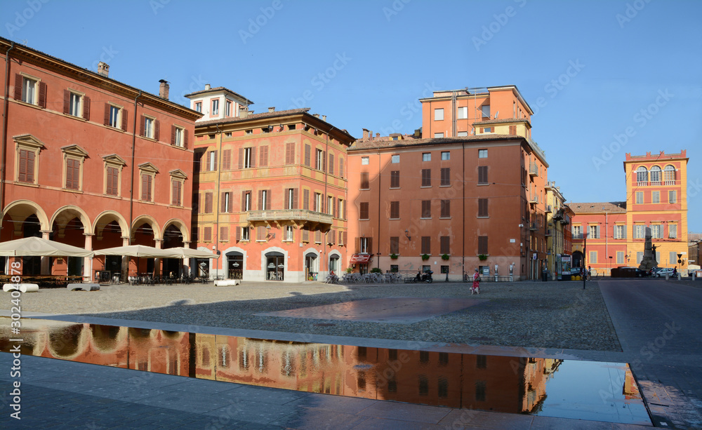 Italy /Modena – June 23, 2019: Piazza Roma and the Military Academy in Modena in Emilia-Romagna. It is known for its balsamic vinegar, opera and Ferrari and Lamborghini sports cars.
