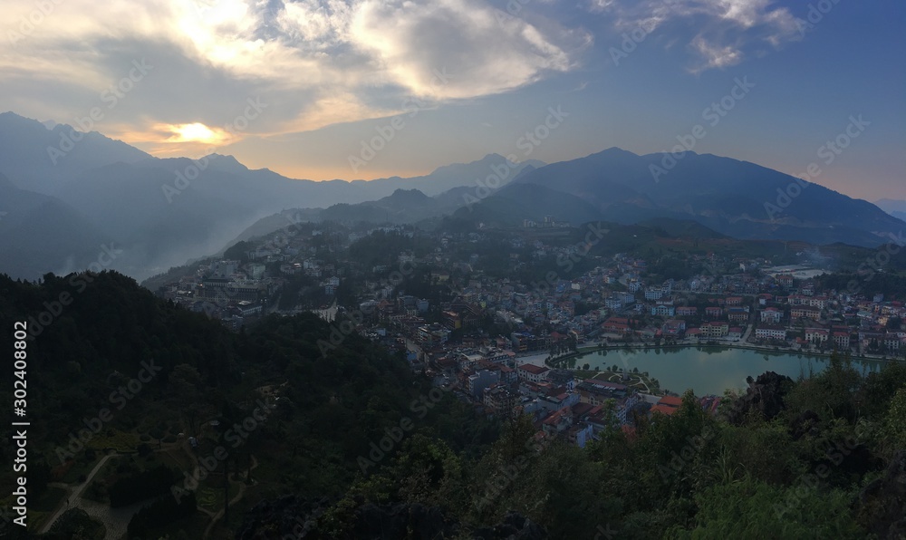 sunset in the mountains, aerial view of the city, Sapa city, North Vietnam, European style city view