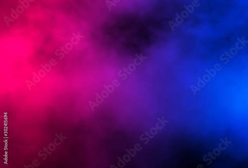 Abstract smoke and swirling fog lit with pink and blue texture background