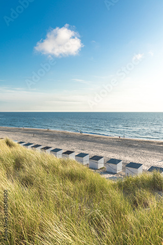 Beach Cabins And High Dunes With Grass At Texel Netherlands