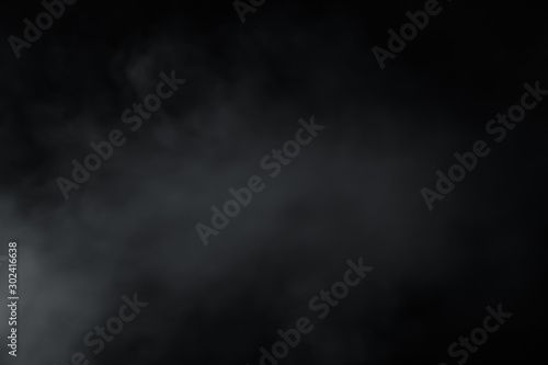 Smoke spread around so soft on black background. Like soft blur fog © TeeRaiden