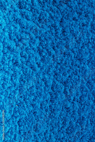 blue hammered metal background,abstract metalic texture, sheet of metal surface painted with hammer paint.