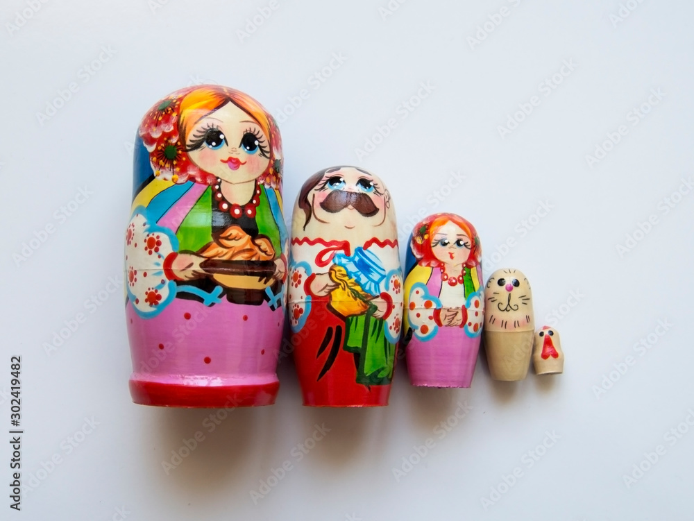 Four colorful wooden matryoshka. Russian folk toys and souvenirs
