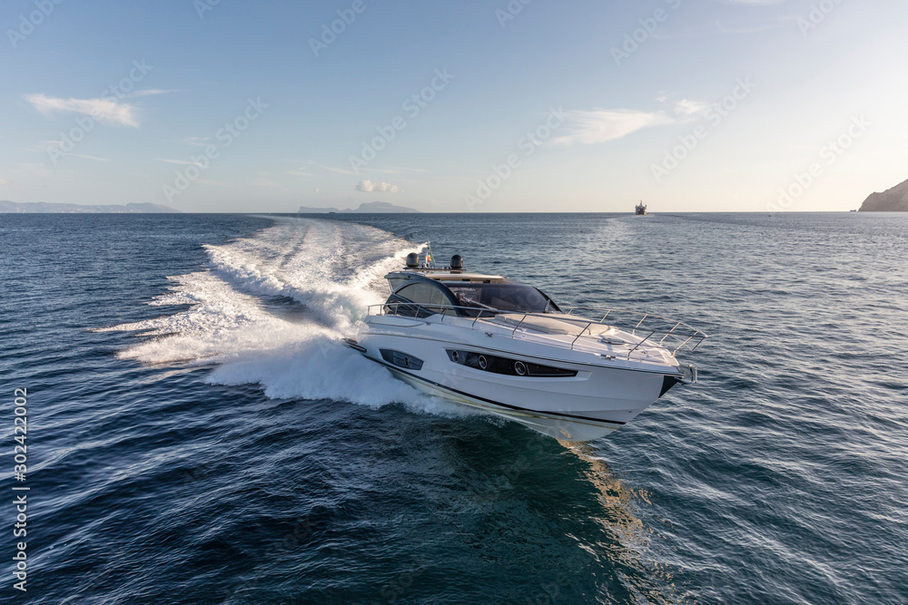 luxury motor yacht in navigation, aerial view