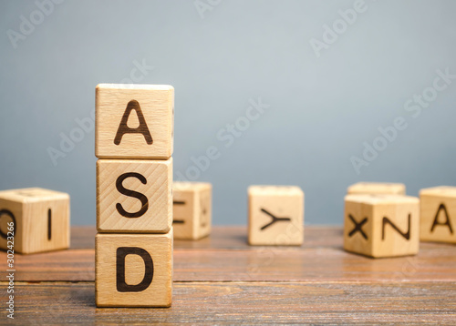 Wooden blocks with the word ASD - Autism Spectrum Disorder. Neurological and ...