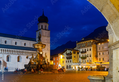 Evening view of square Piazza Duomo in Trento city with Fountain