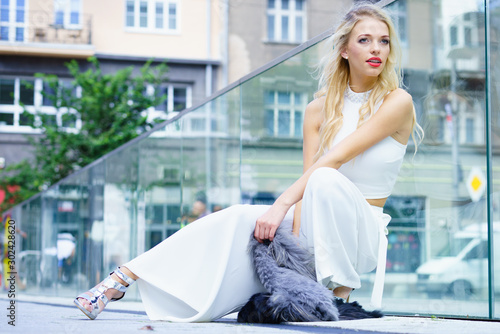 Woman wearing crop top and culottes photo