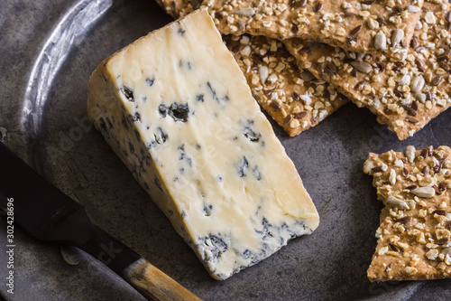 Canvas Print Mature Stilton cheese with spelt crackers