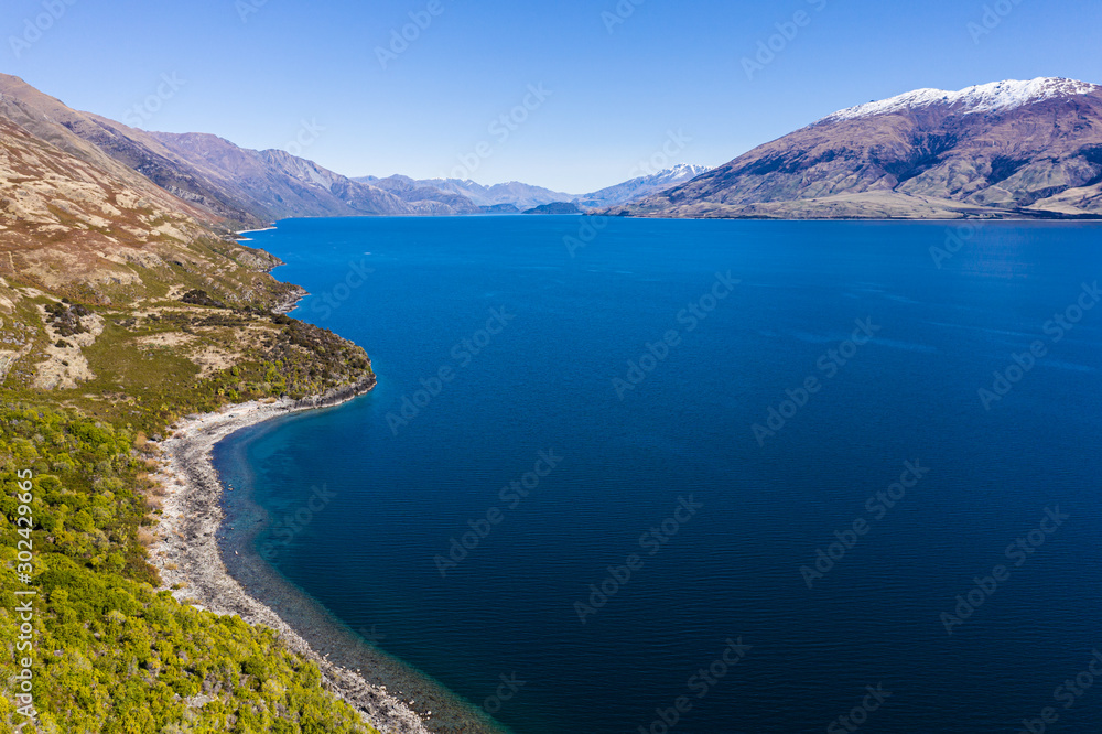 Stunning aerial view of lake Wakapitu near Queenstown in New Zealand south island in spring