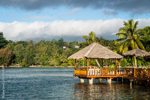 Bild auf Leinwand Tropical hut in the Port Vila lagoon in Vanuatu in the south Pacific