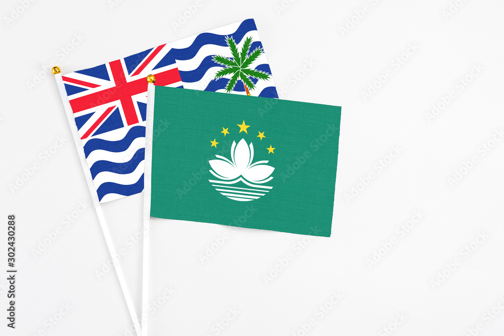Macao and British Indian Ocean Territory stick flags on white background. High quality fabric, miniature national flag. Peaceful global concept.White floor for copy space. Macao and British Indian Ocean Territory stick flags on white background. High quality fabric, miniature national flag. Peaceful global concept.White floor for copy space.