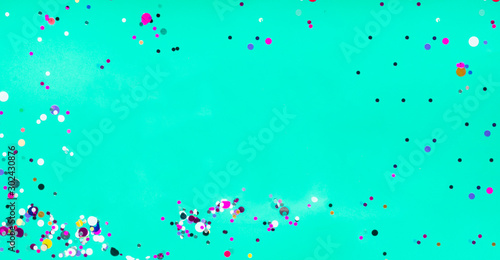 Closeup of trendy green mint colored background with empty space. Color trend concept. Festive postcard. Top view, flat lay