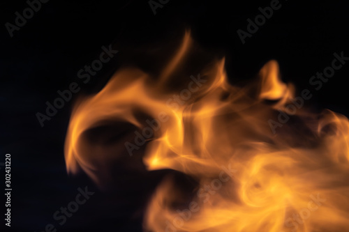 Soft blur flame with soft detail moving from right to the left on black background. For overlay effect