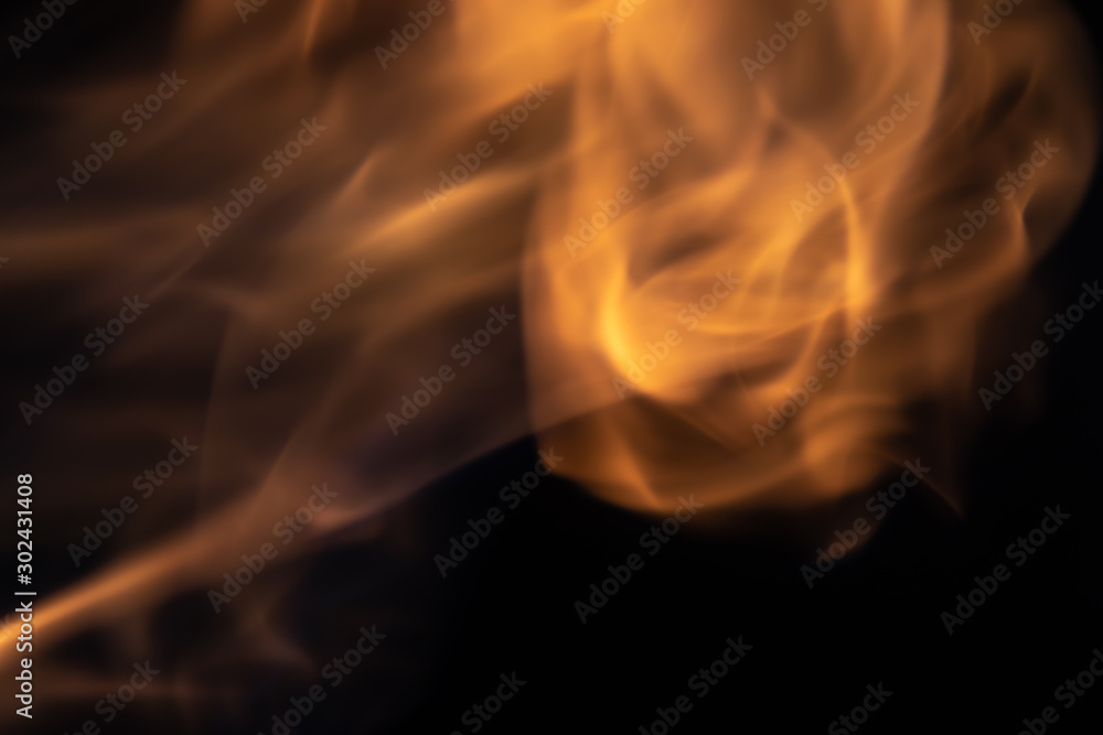 Soft blur flame like fire ball on black background. For overlay effect Soft blur flame like fire ball on black background. For overlay effect