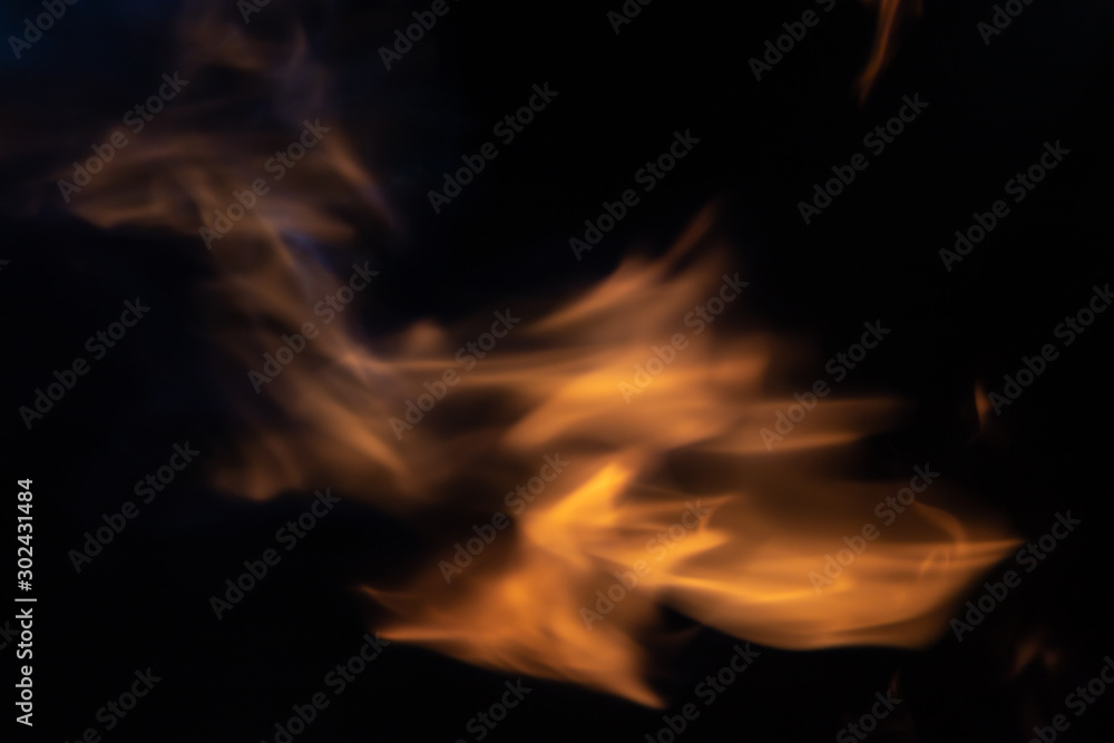 Soft blur flame from moving around in center with some blue flame on black background. For overlay effect Soft blur flame from moving around in center with some blue flame on black background. For overlay effect