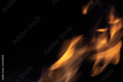 Soft blur flame with soft detail moving from bottom to the top on black background. For overlay effect