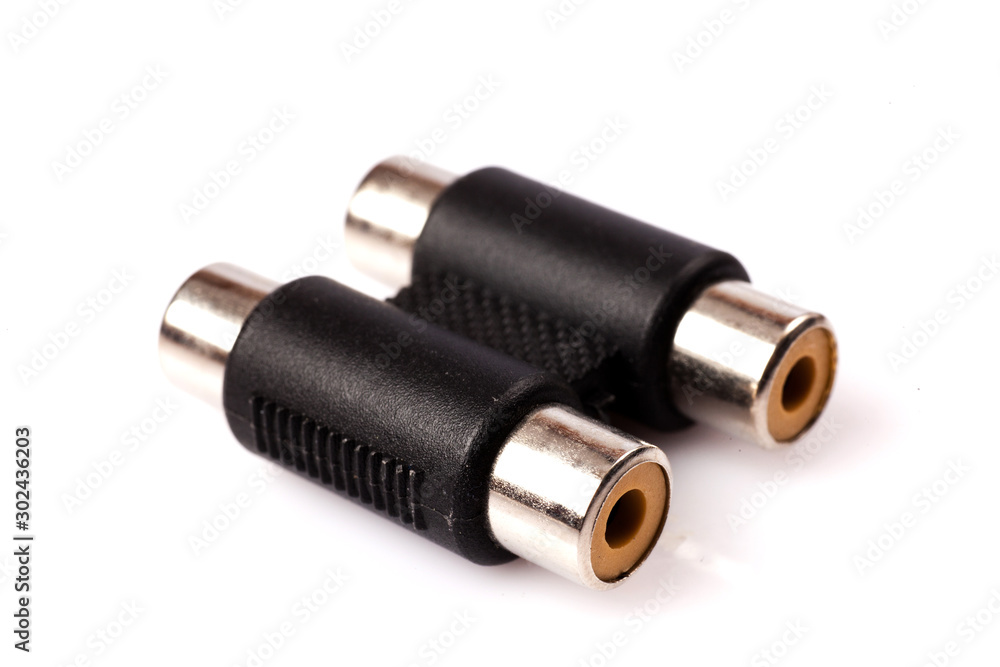 Stereo Plug To Dual RCA Jack Adapter isolated on white background Stereo Plug To Dual RCA Jack Adapter isolated on white background