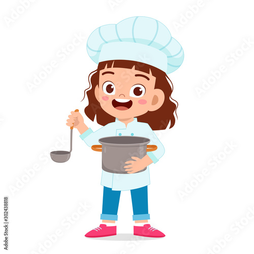 happy cute kid girl in chef costume