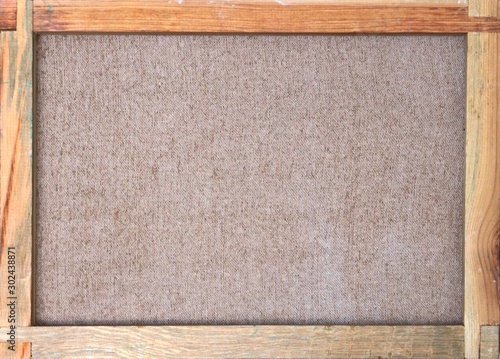 rough brown canvas texture with brown fabric and wooden frame - back side view