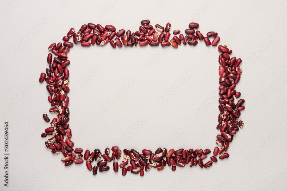 Obraz premium The concept of frame of red beans. Healthy and dietary food