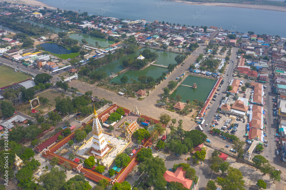 Aerial view shot of Wat Phra That Phanom in That Phanom District at Nakhon Phanom Province - Thailand.