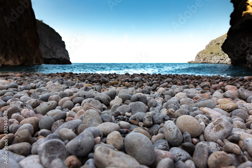 Paradisiacal mouth of the Torrent de Pareis, forms the cala Calobra, a beach of gravel rocks