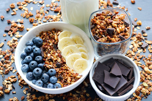 Bowl of homemade granola with yogurt and fresh berries