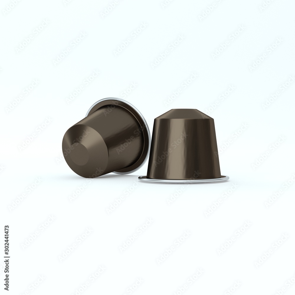 Two Brown espresso coffee capsules. Two Brown espresso coffee capsules.