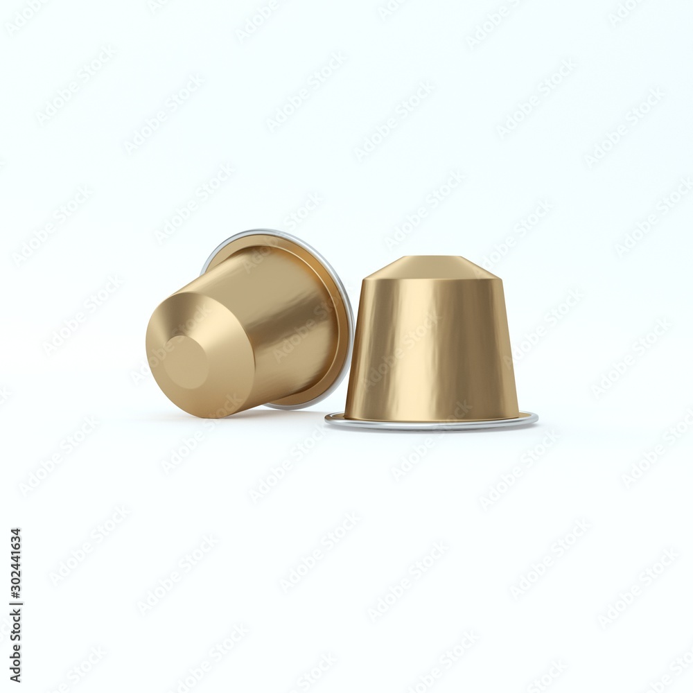 Two golden espresso coffee capsules. Two golden espresso coffee capsules.