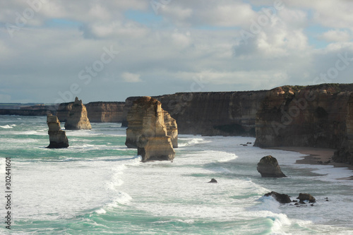  wild winter waves crashing against iconic Australian sandstone rock formations, the twelve apostles, great ocean road, Southern Victorian Coast