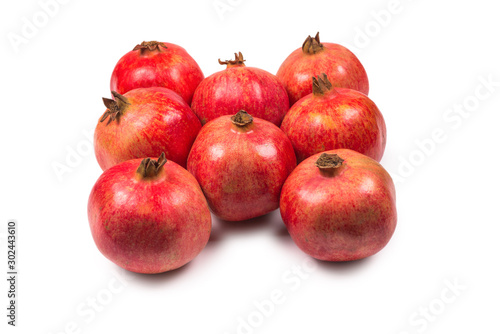 Sweet pomegranate isolated on white background.