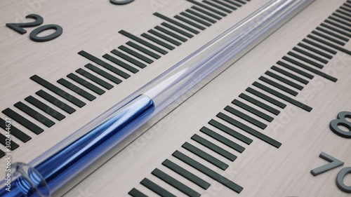 Temperature dropping in wooden thermometer. Animation of decreasing temperature.