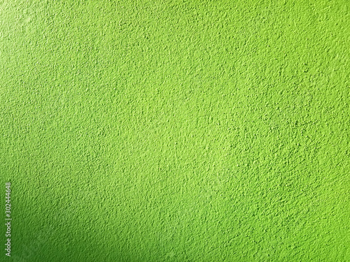 Green cement wall background in vintage style