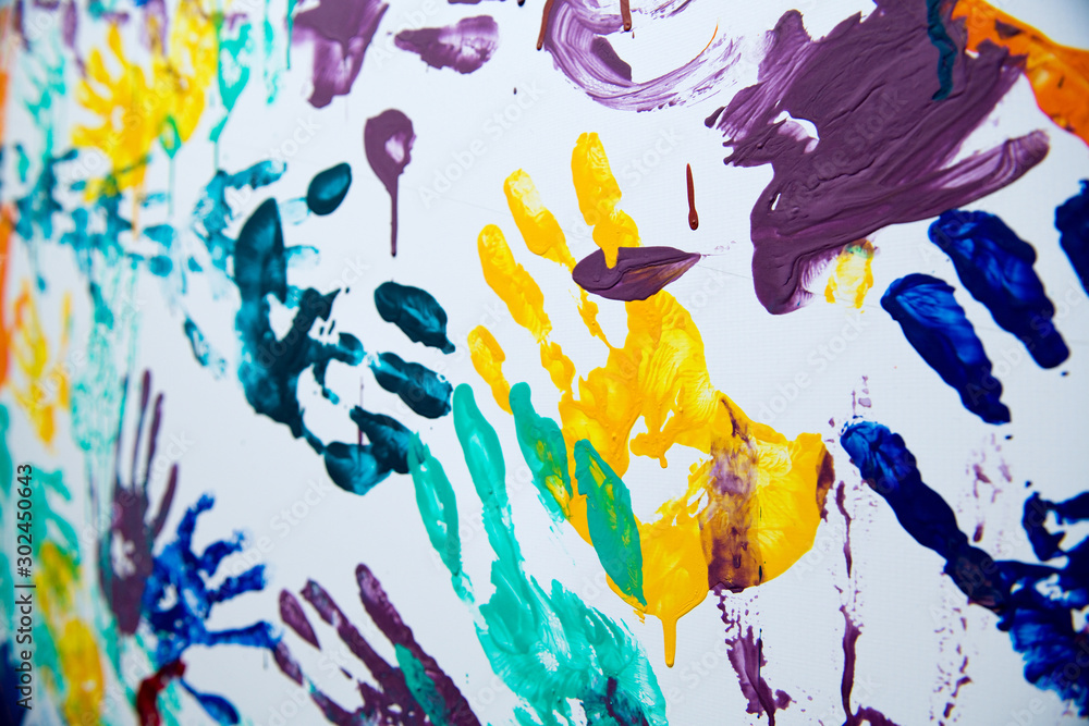 Fototapeta color handprints on the wall