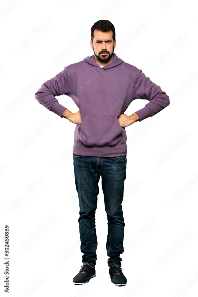 Full-length shot of Handsome man with sweatshirt angry over isolated white background Full-length shot of Handsome man with sweatshirt angry over isolated white background