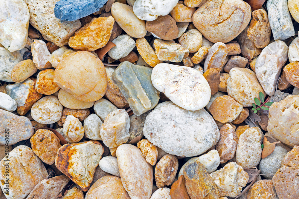 Background of small stones of various shapes and colors. Background of small stones of various shapes and colors.