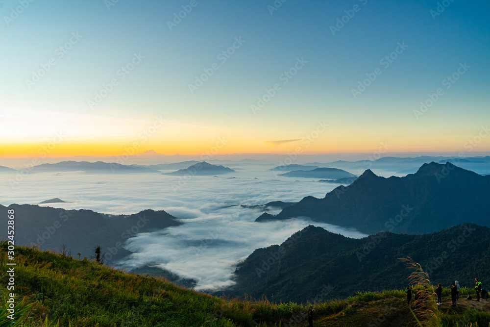Sunrise and Mist mountain in Phu Chi Fa located in Chiang Rai, Thailand. Phu Chi Fa is the natural border between Thailand and Laos.