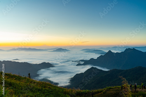 Fototapeta Naklejka Na Ścianę i Meble -  Sunrise and Mist mountain in Phu Chi Fa located in Chiang Rai, Thailand. Phu Chi Fa is the natural border between Thailand and Laos.