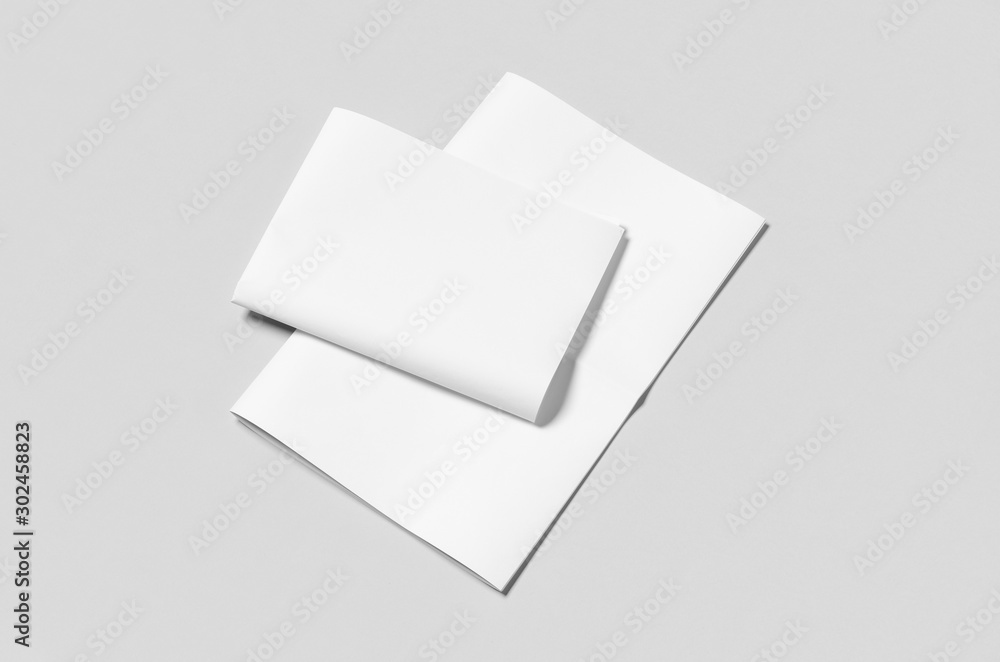 Blank newspaper mockup on a grey backgound. Blank newspaper mockup on a grey backgound.