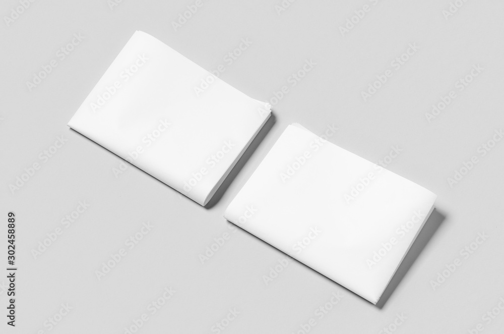 Blank newspaper mockup on a grey backgound. Blank newspaper mockup on a grey backgound.