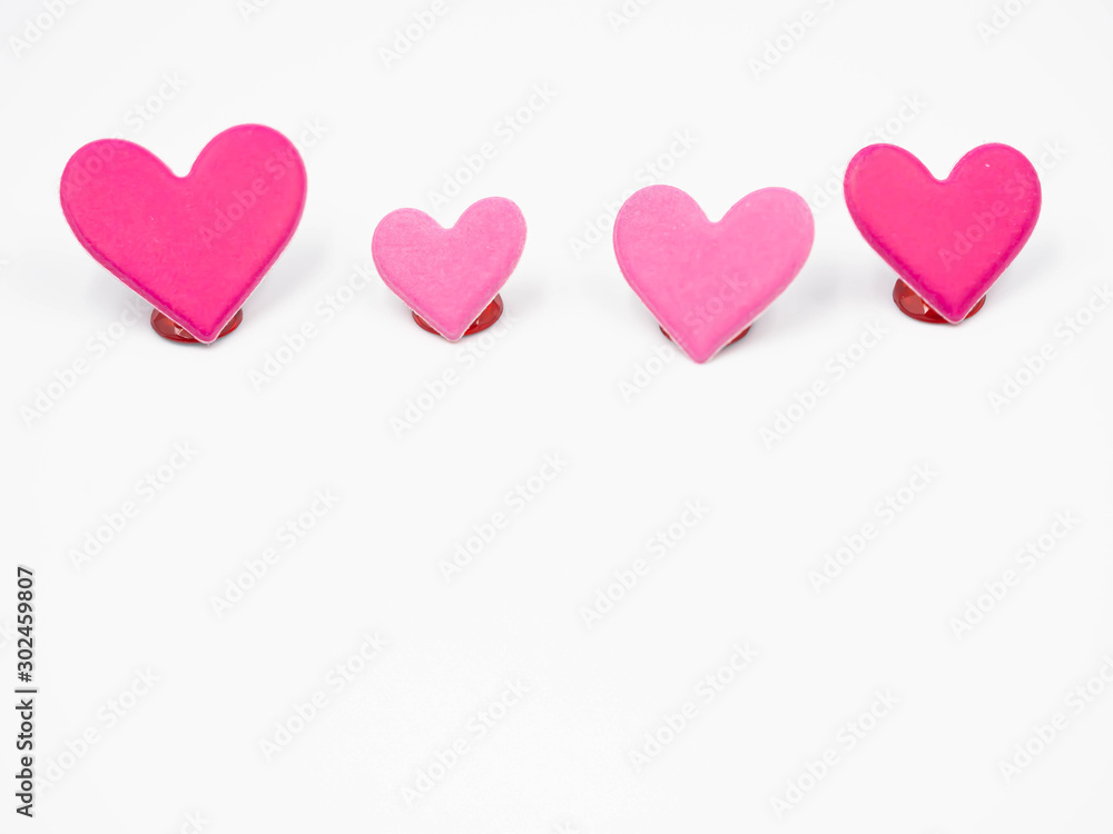 Closeup of vivid and vibrant pink and pastel pink hearts shape on gray color background. Valentine 's day, wedding ,love, sweet and romance concepts and ideas.