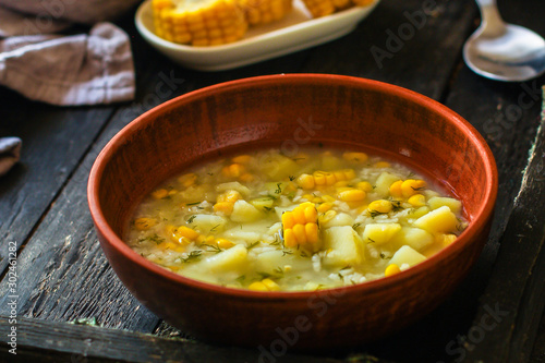 soup with corn and vegetables (first course, vegetarian dish) menu concept. food background. copy space. Top view