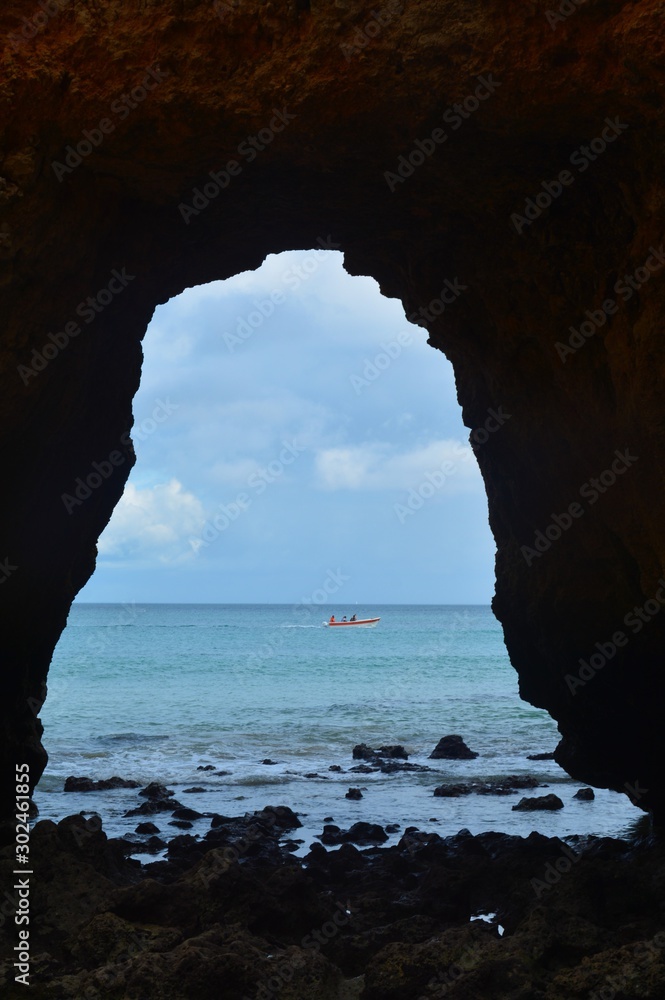 the ocean seen through the hole of a rock in Lagos
